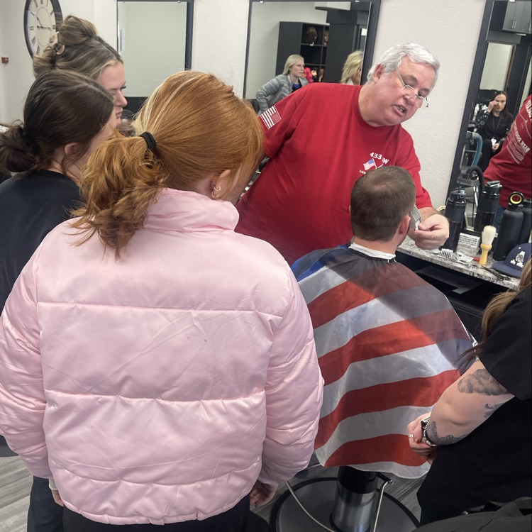 guest stylist teaching men’s cut