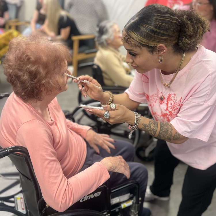 young woman apply makeup 