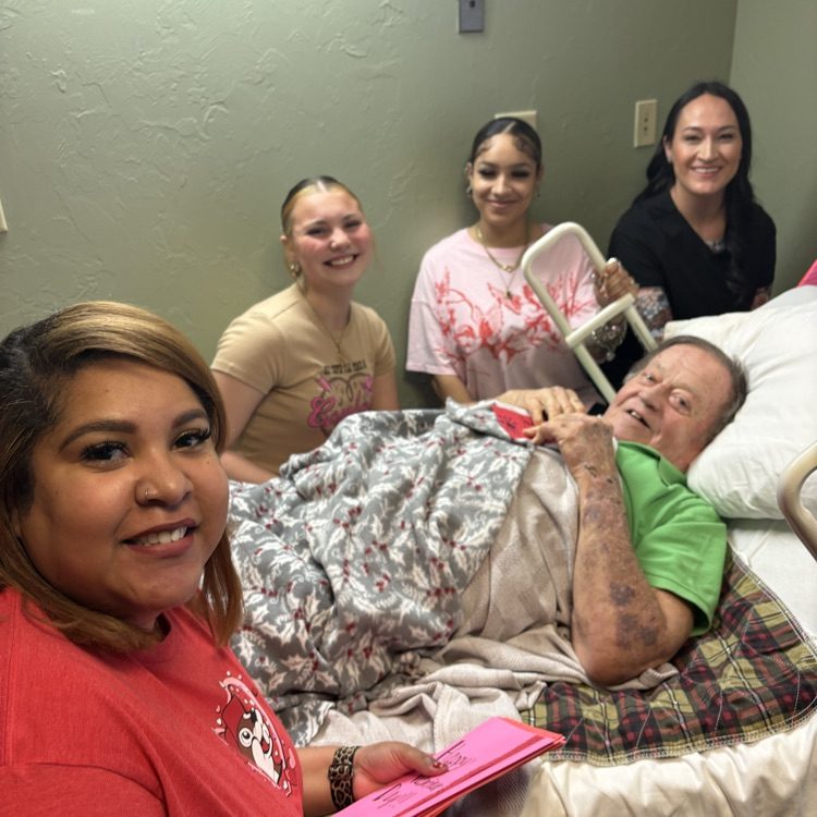 women hading out Valentine Card 