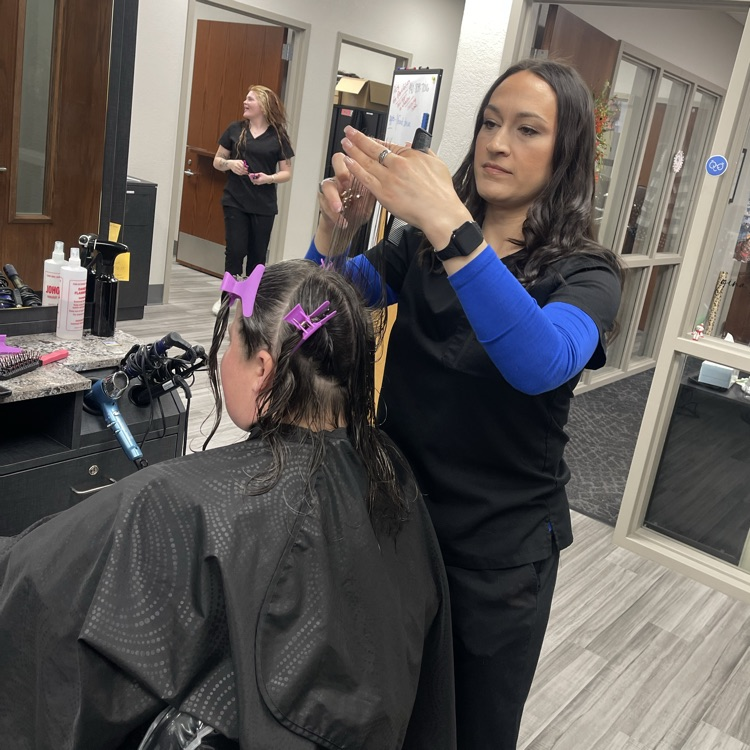 woman getting haircut