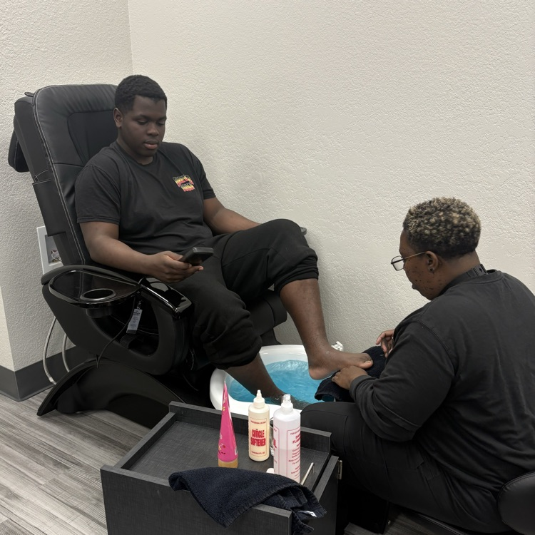 man getting pedicure