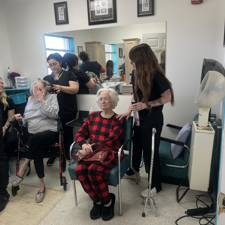 cosmo students doing hair 