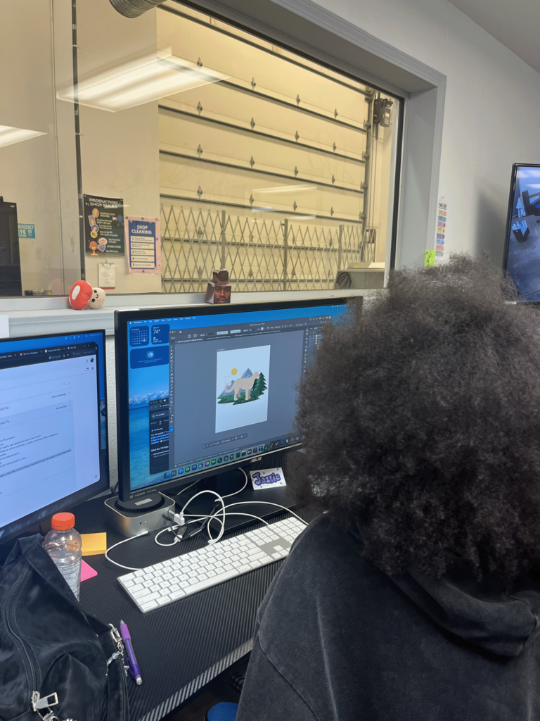 students working on illustrations for their project 