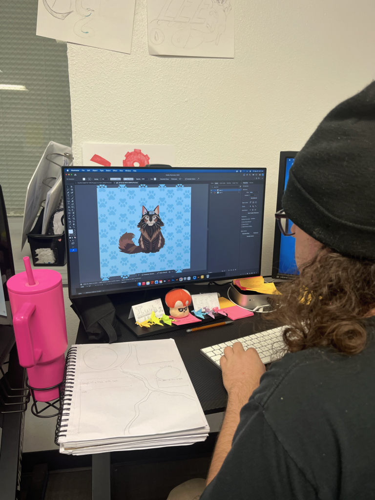 students working on illustrations for their project 