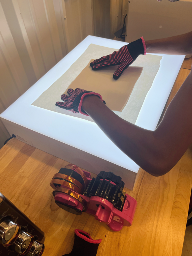 student lining up the image with the mouse pad