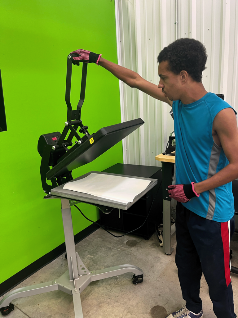 students pre pressing the mouse pad