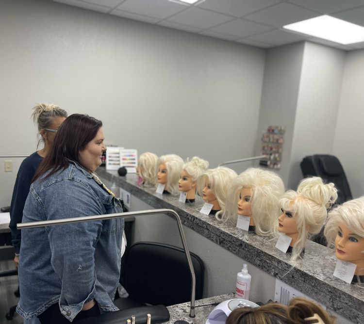 teachers judging Dolly inspired hairstyles