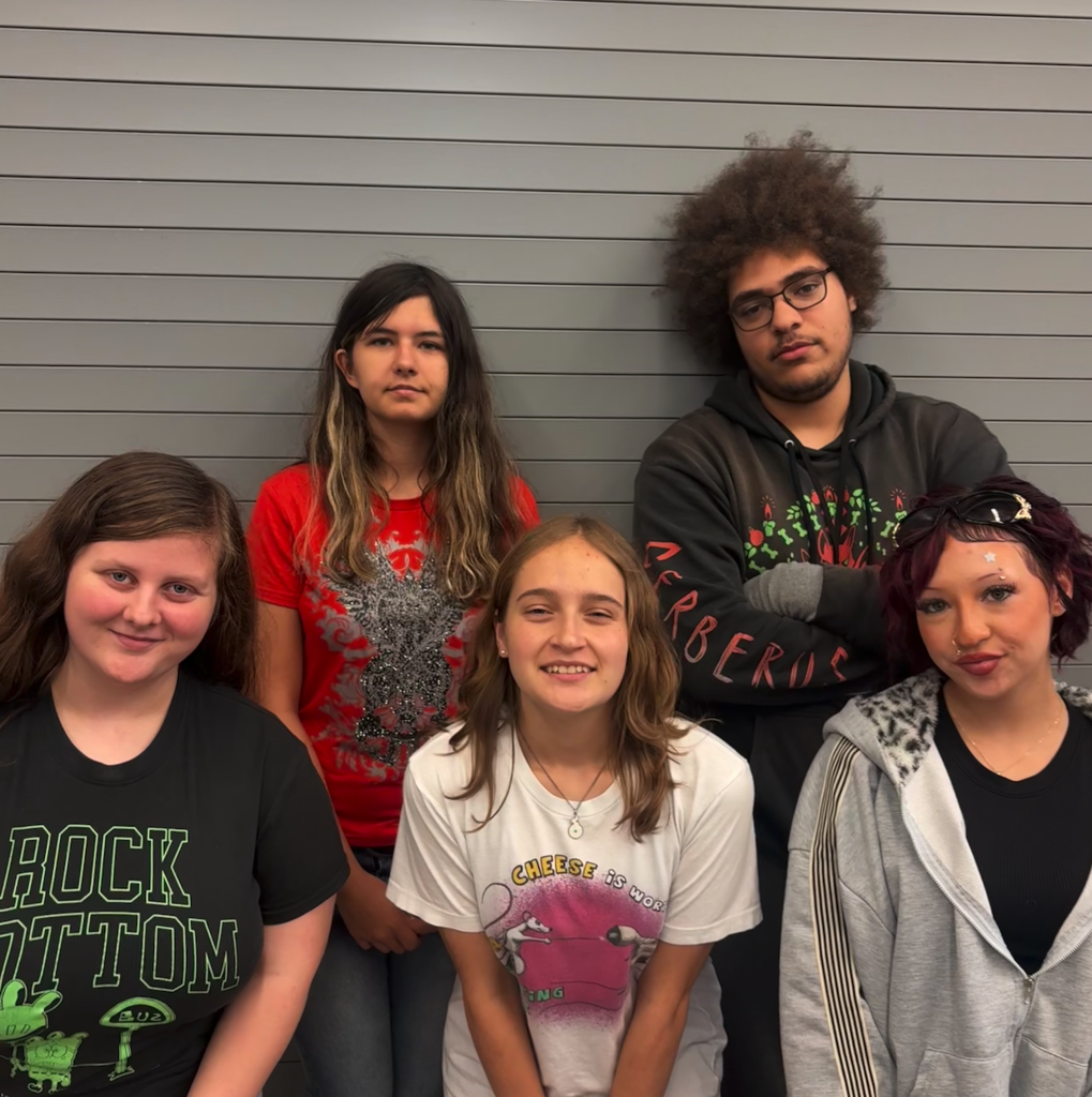 students smiling together for photo