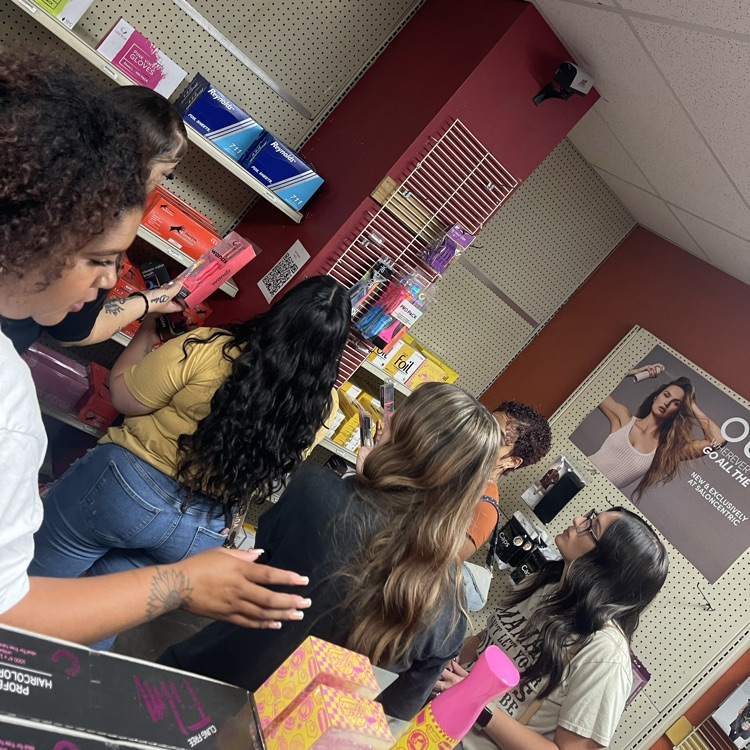 Cosmo students browsing beauty store 