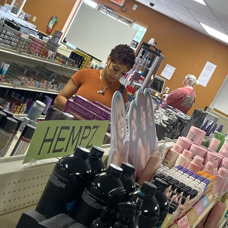 Cosmo students browsing beauty store 