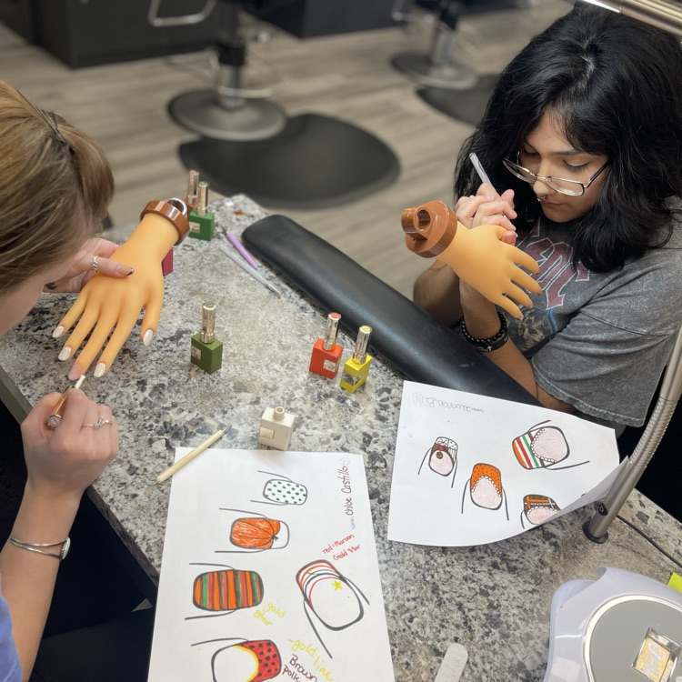 Cosmo students doing nails
