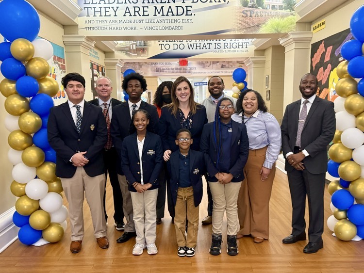 Ellen Weaver is greeted by Cleveland Academy students and staff