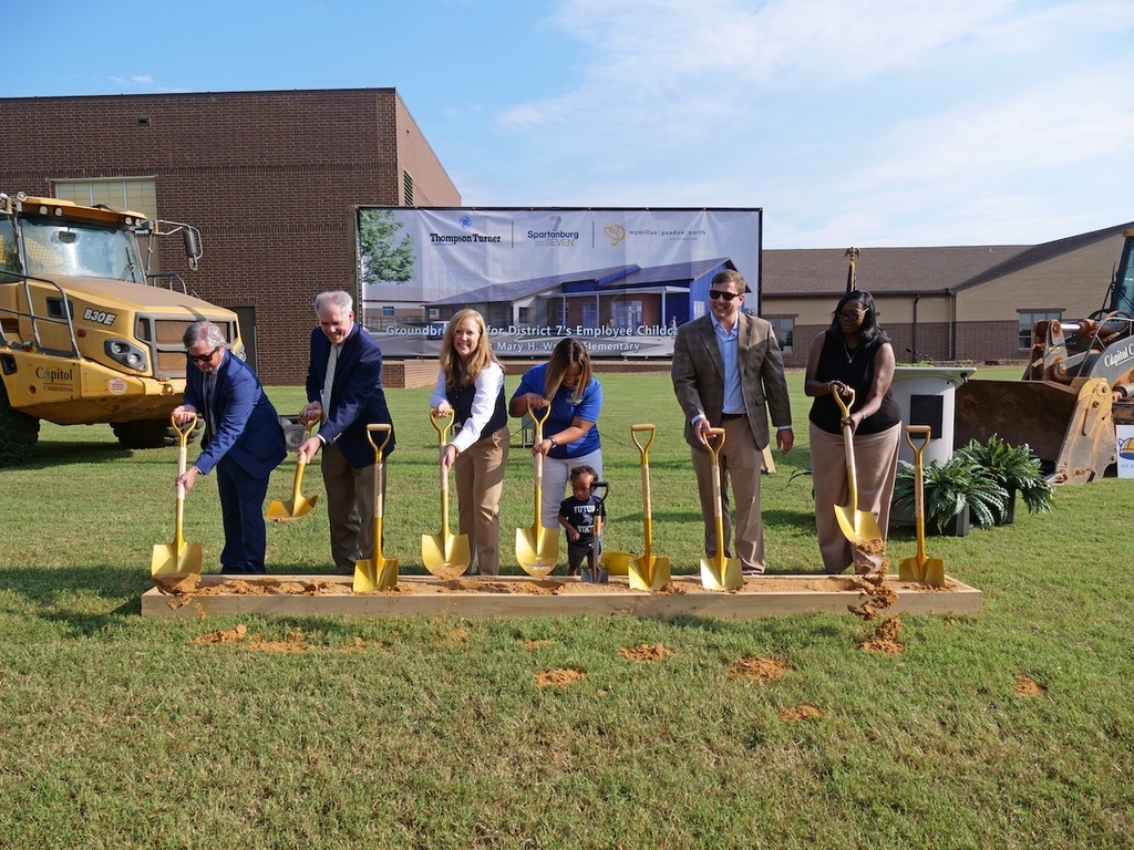 District 7 representatives and project partners break ground