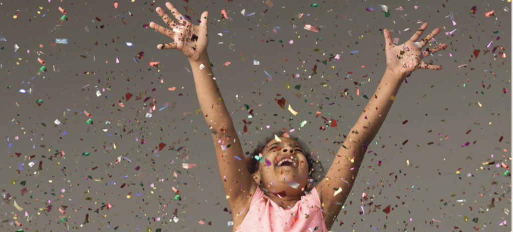 child celebrating