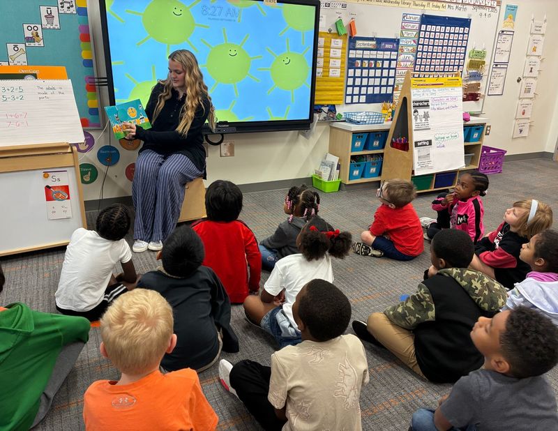 SHS Cadet reading at DMES