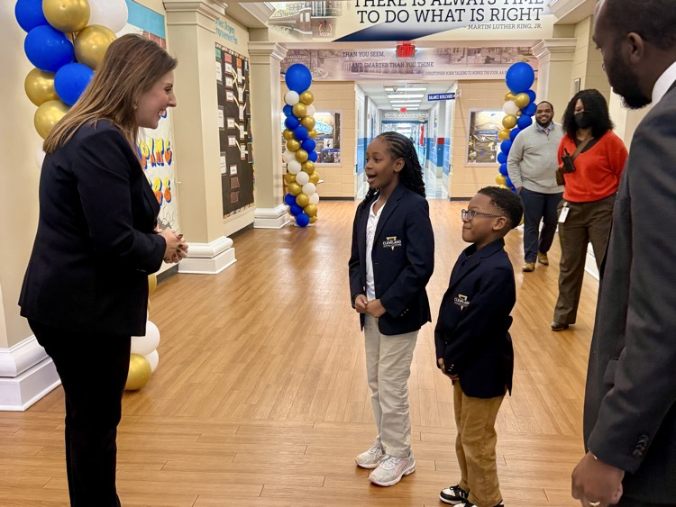 Ellen Weaver is greeted by Cleveland students
