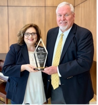 Helen Tipton and Jeff Kuntz with the OPA Gold award