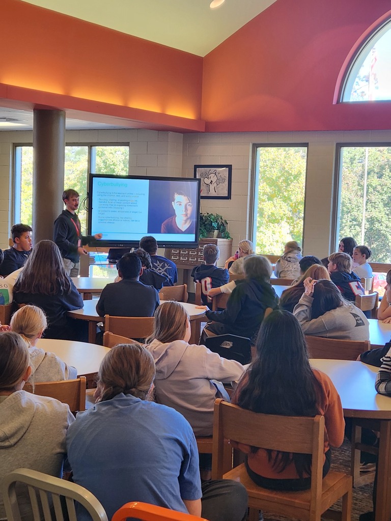LMS students listening to presentation in the library