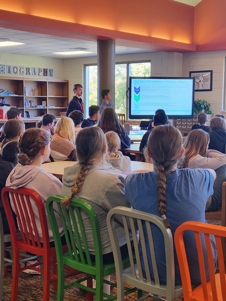 LMS students listening to presentation in the library