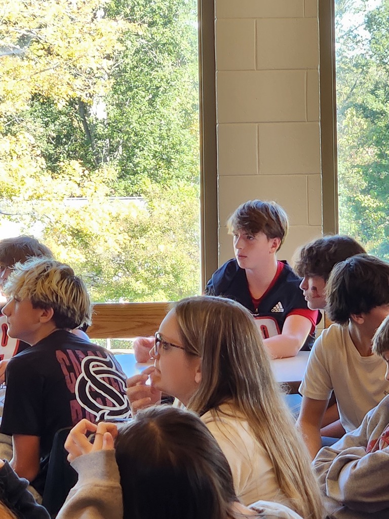 LMS students listening to presentation in the library