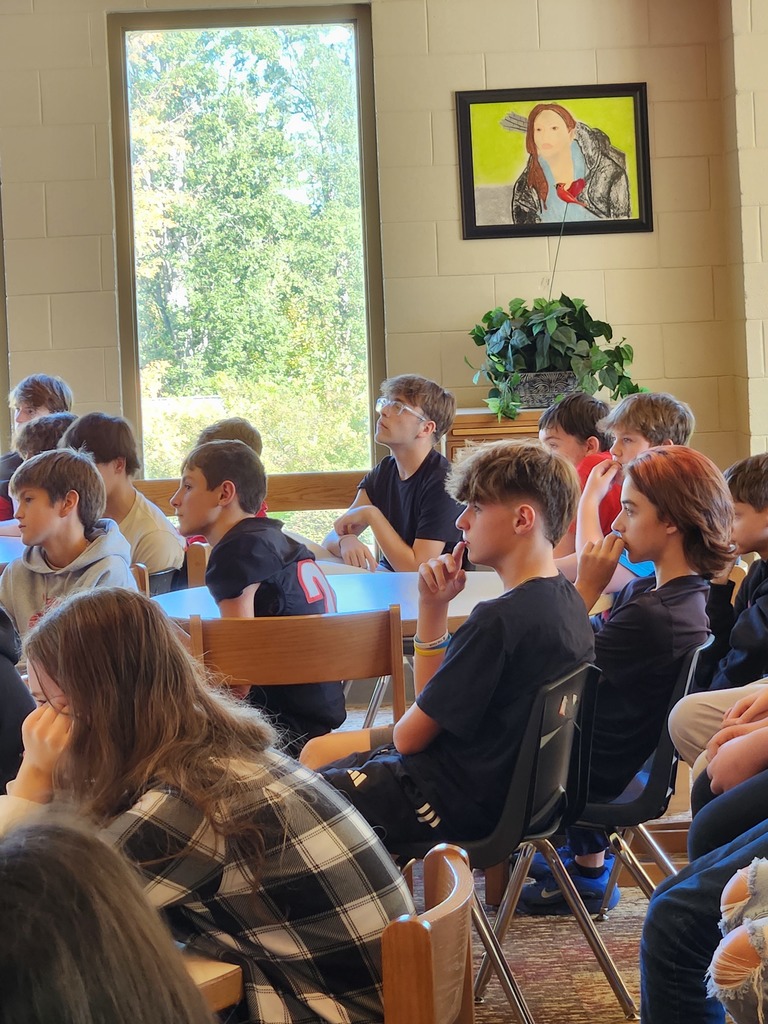 LMS students listening to presentation in the library