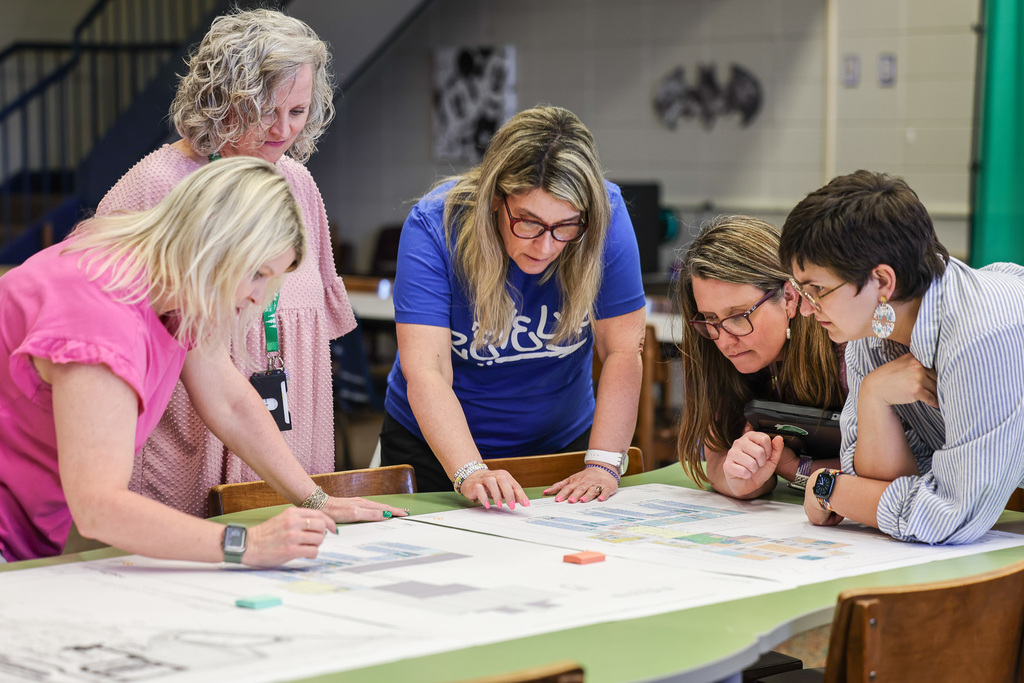 MMS teachers looking at building plans.  