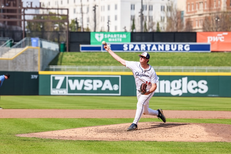 Chapman high school baseball player throwing a pitch from fifth third Park