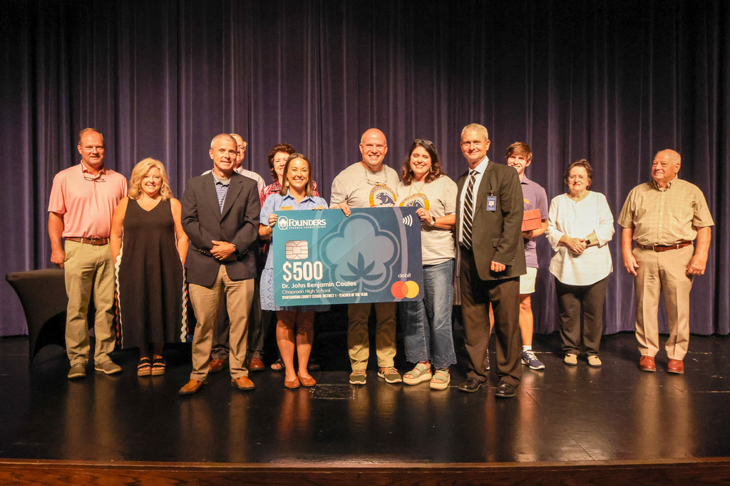 Dr. Ben Coates and family with Jostens and Founders Rep