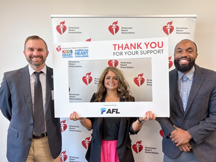 Jeremy Darby, Briana Wright and Robert Jordan smiling