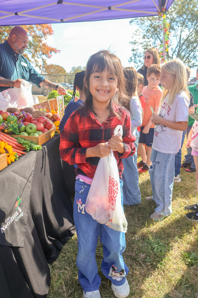 Student Buying Food at the farmers market