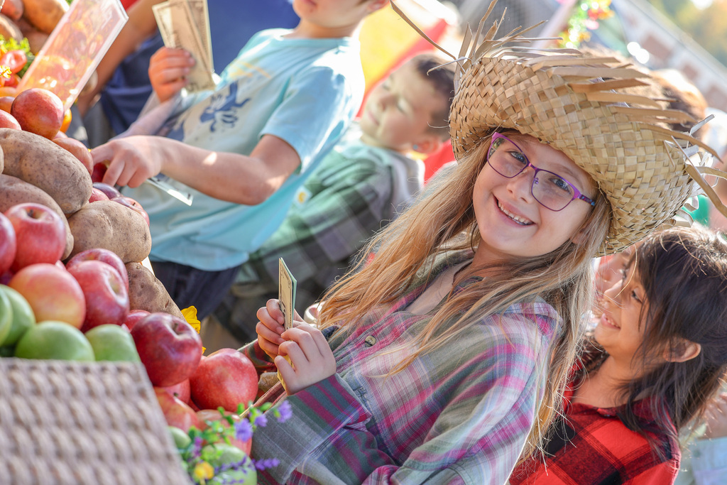 Student Buying Food at the farmers market