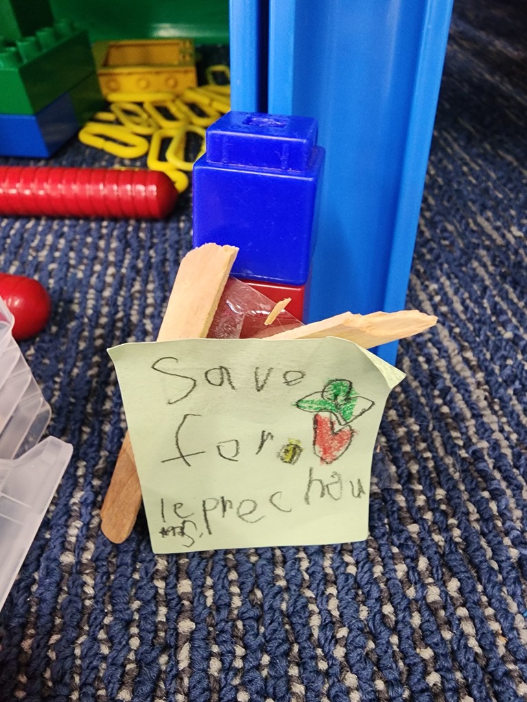 Mrs. Larson's friends writing notes to leprechauns!
