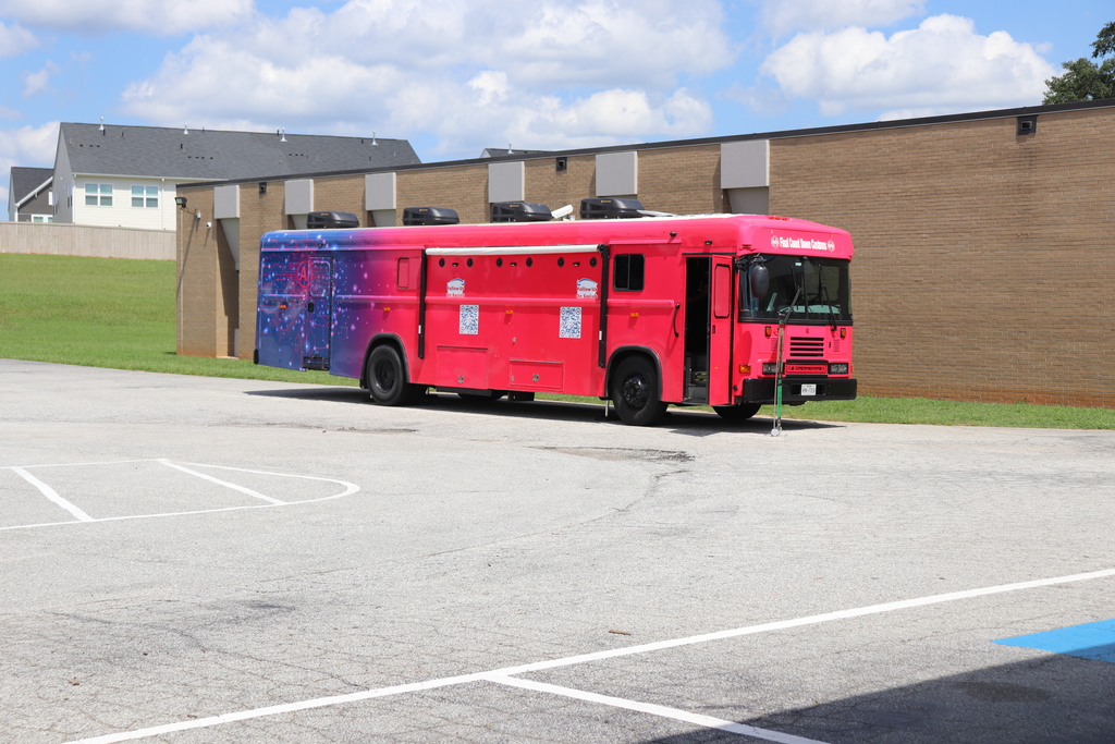 Pink Bus Cybersecurity Experience at DMTC