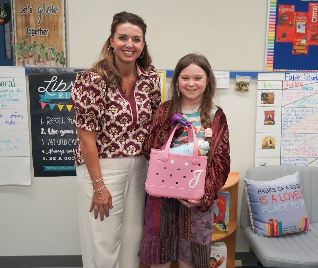 Each year, students at Cowpens Elementary School compete in Broad River Electric Cooperative's Children's Book Challenge.  We are proud to share that three Cowpens Elementary 5th grade students were selected as winners! Juniper Symons won the individual contest, while Joanna Patton and Sophia Coyle won the partner contest.  Students participating in the challenge are required to write and illustrate a children's book. This year's theme was "A Day in the Life of a Lineman."   Juniper, Joanna and Sophia won out of all students in Spartanburg, Cherokee and Union counties! They completed their research and wrote their books while in Mrs. Summey's library class.   Congratulations!