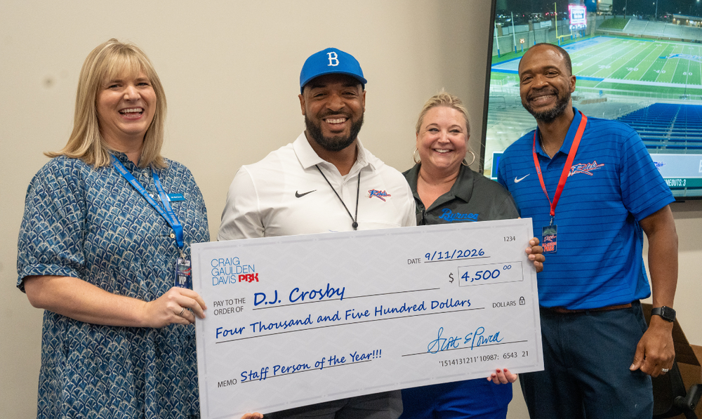DJ Crosby receives check from CGD PBK architecture