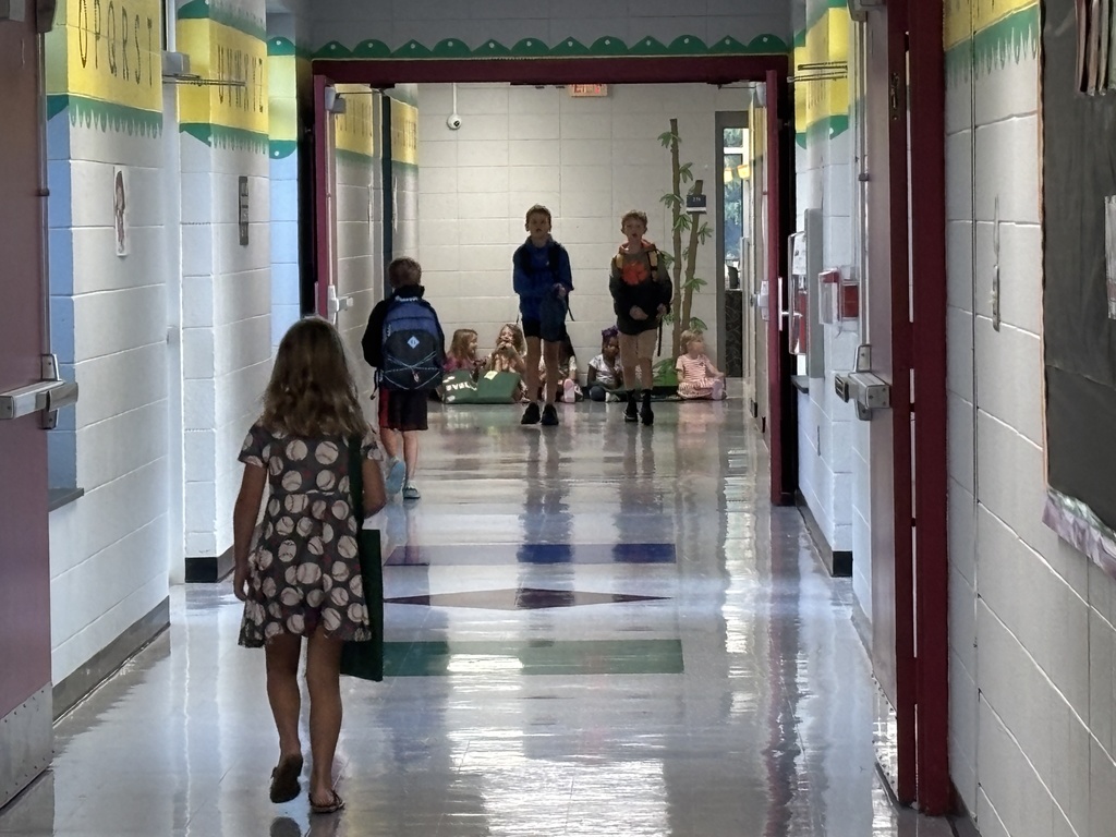 K5 heading straight down the hallway to their classrooms.