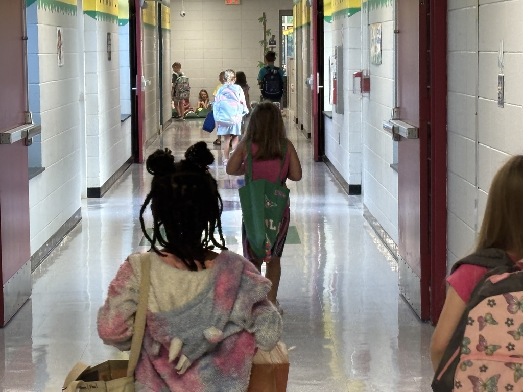K5 heading straight down the hallway to their classrooms.
