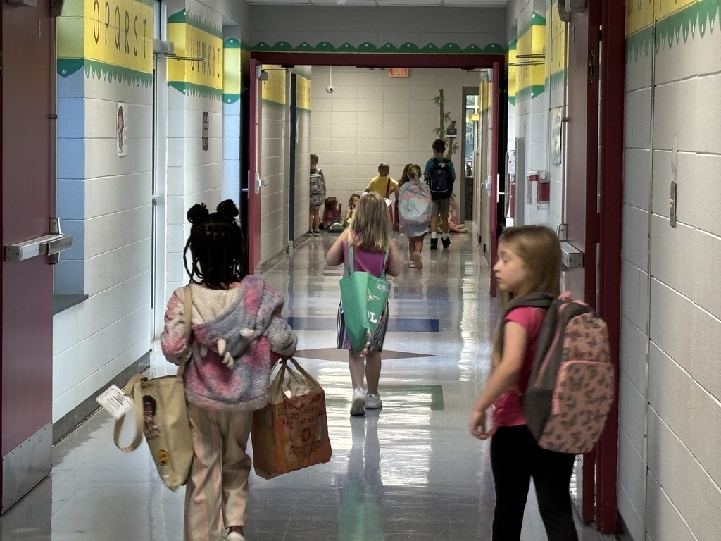 K5 heading straight down the hallway to their classrooms.