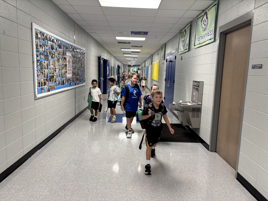 K5 heading straight down the hallway to their classrooms.
