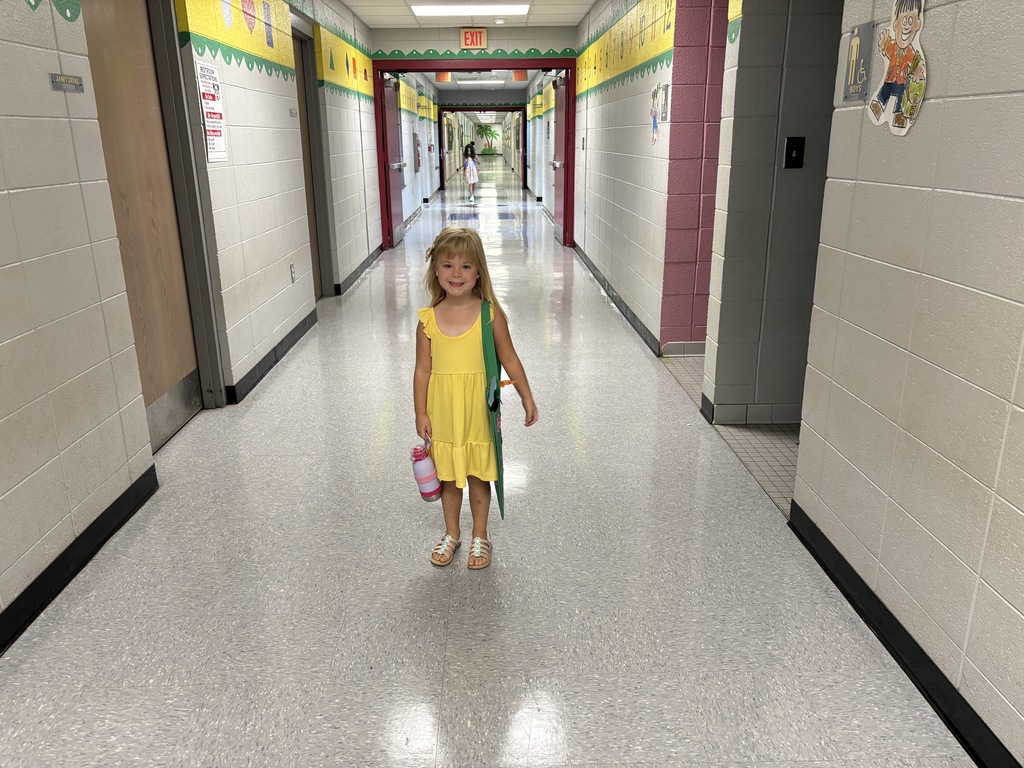 K5 heading straight down the hallway to their classrooms.