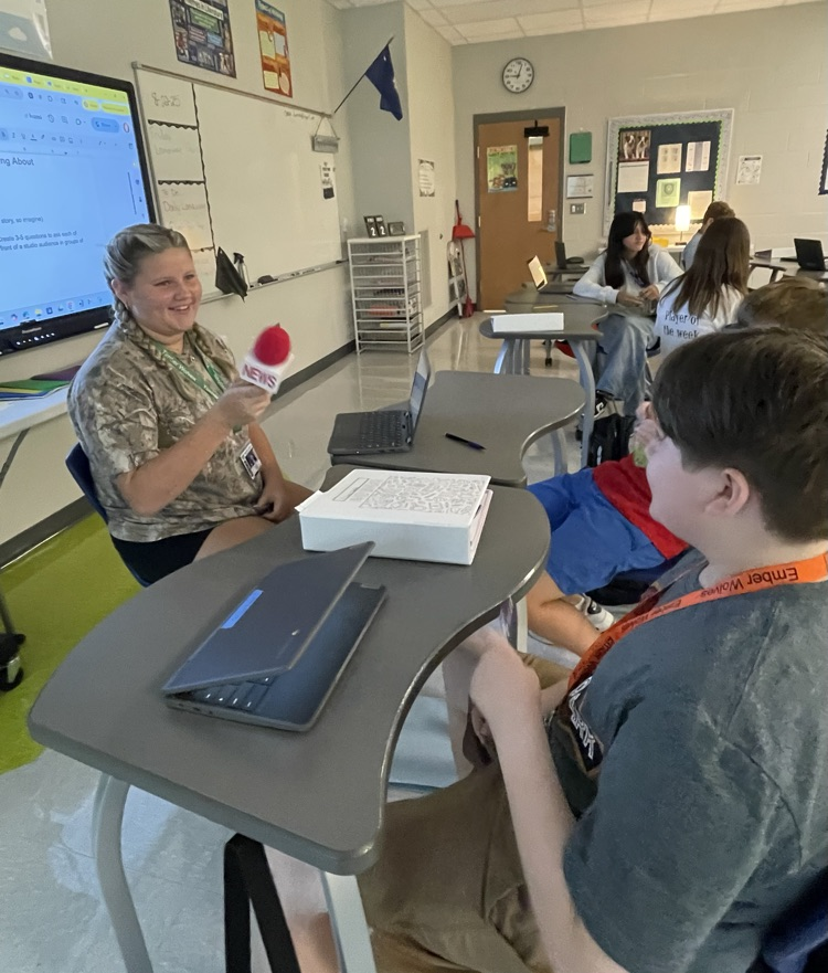 students interviewing each other
