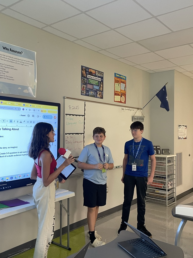students interviewing each other