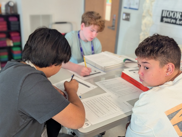 kids working in on writing