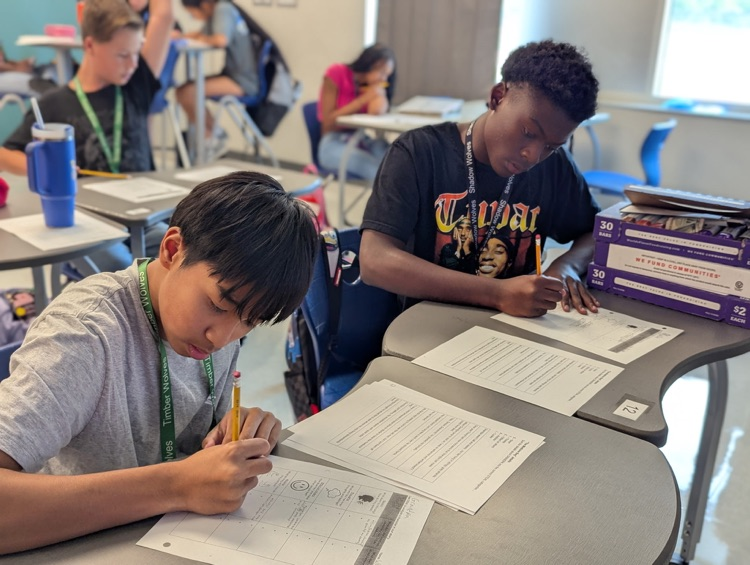 kids working in on writing