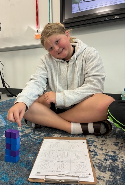 Jone's class using blocks to explore volume