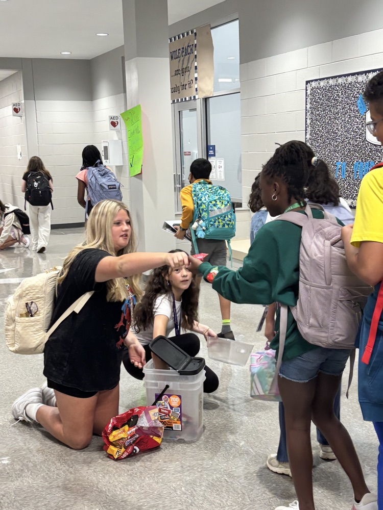 kids handing out candy