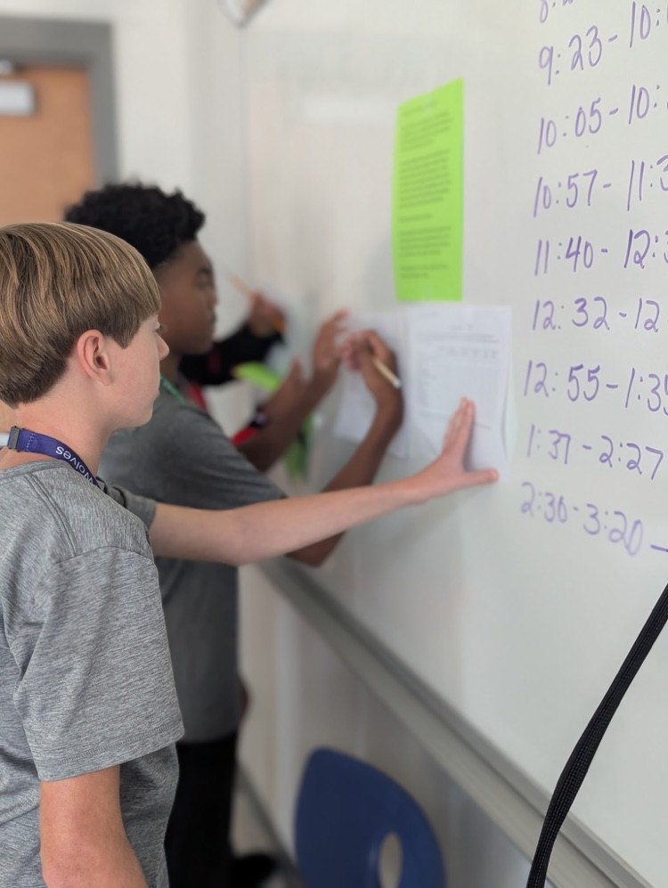 students working on writing