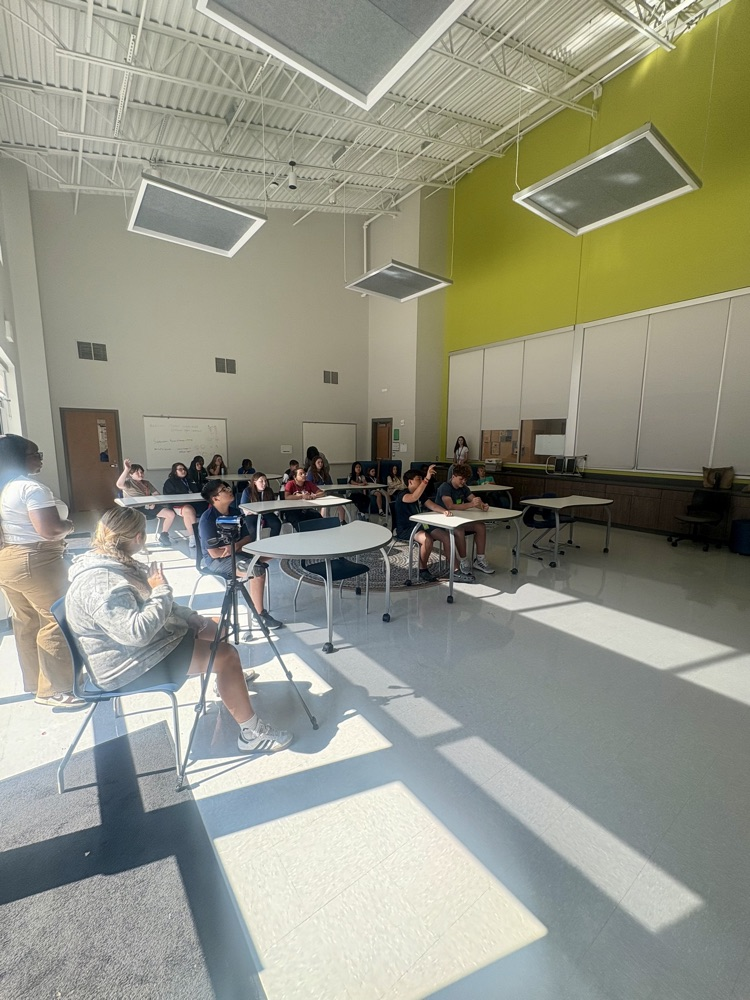 podcast speaker and students
