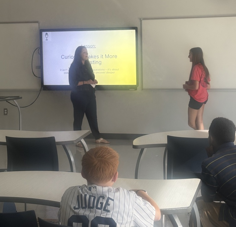 podcast speaker and students