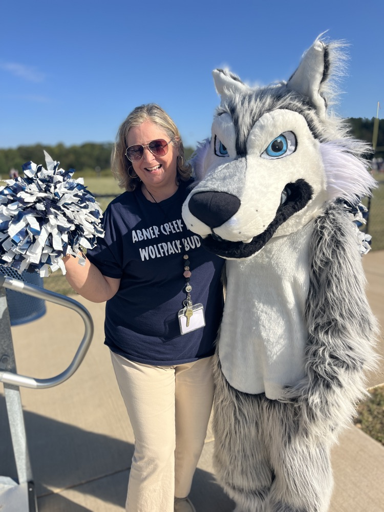 teacher or kids  with the mascot 
